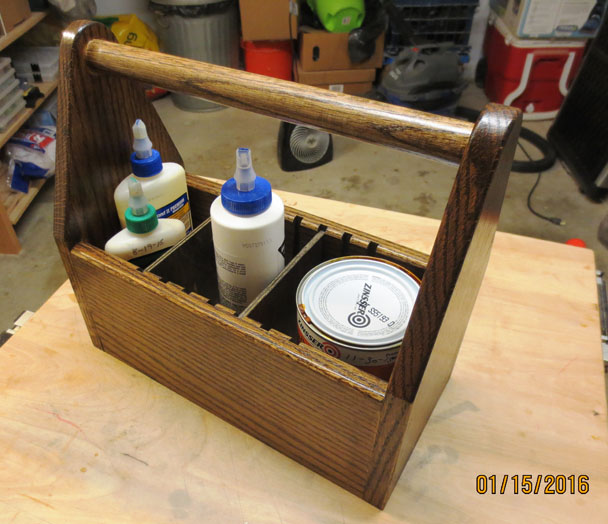 View of Glue Tote with Glue Bottles, a One-quart Can, and Two Partitions