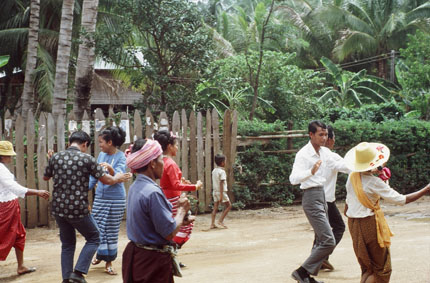 Group Dancing Through Town