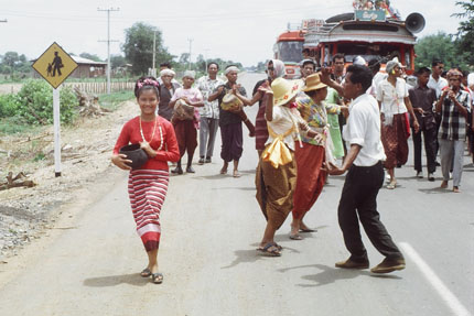 Malee with Others Dancing Toward Town