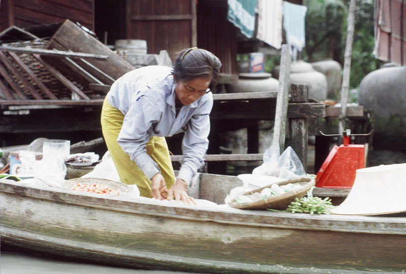 Woman Standing in Her Boat